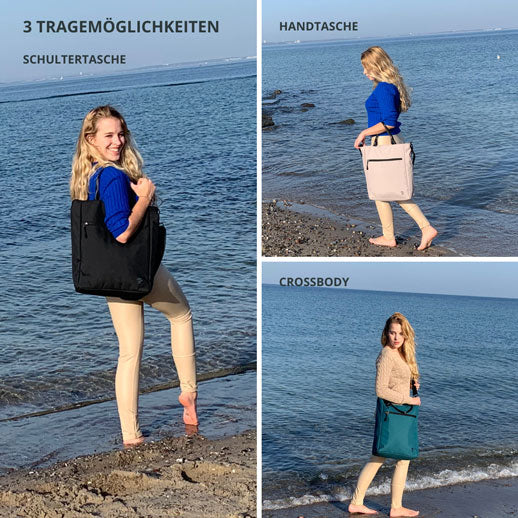 Frau spaziert am Strand mit den FUCHS und REBELL JONA Umhaengetaschen und zeigt die drei Tragemoeglichkeiten - Cross-Body, Schultertasche, Handtasche.
